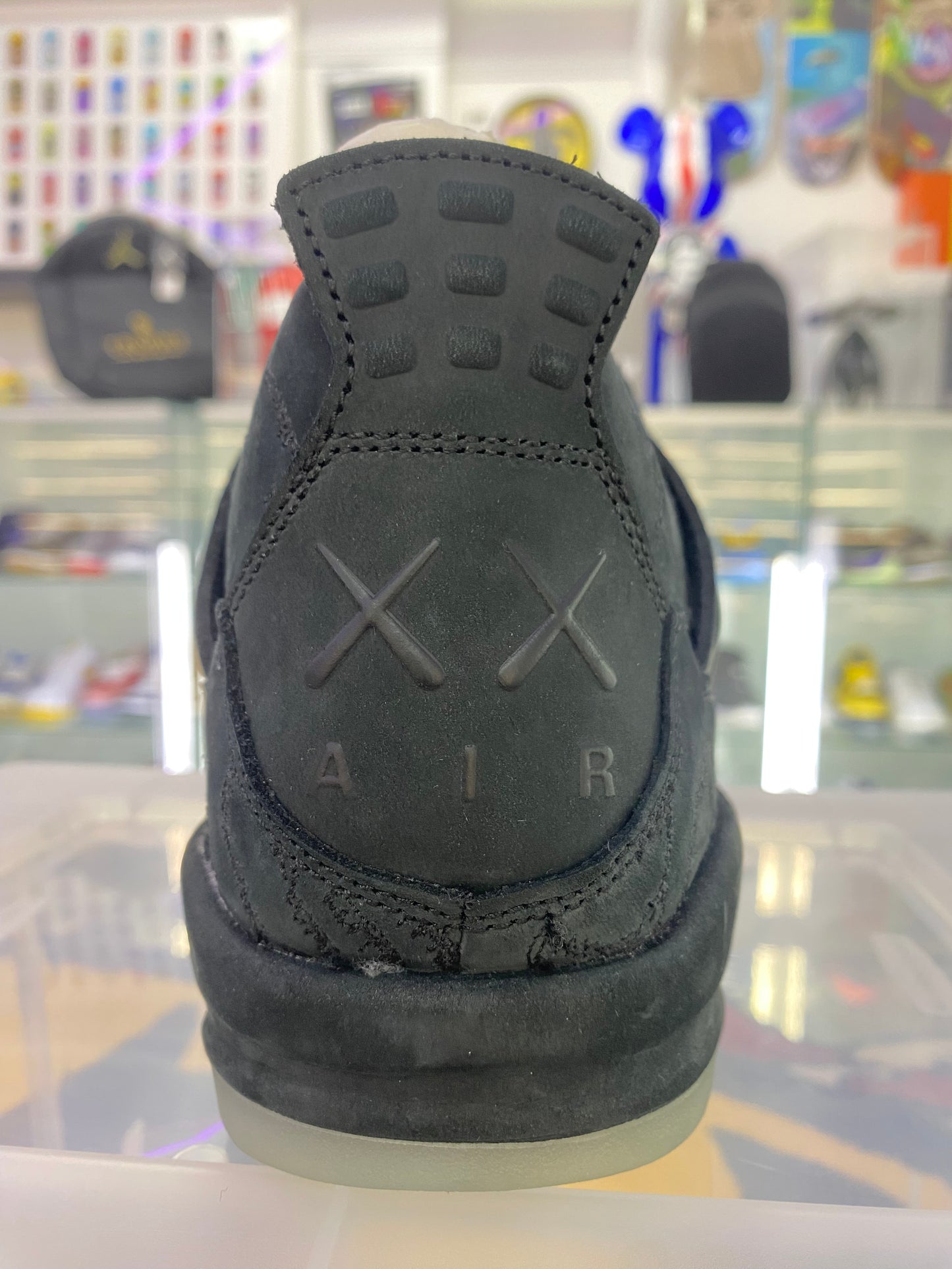 Air Jordan 4 Retro x KAWS 2017 Black/Glow