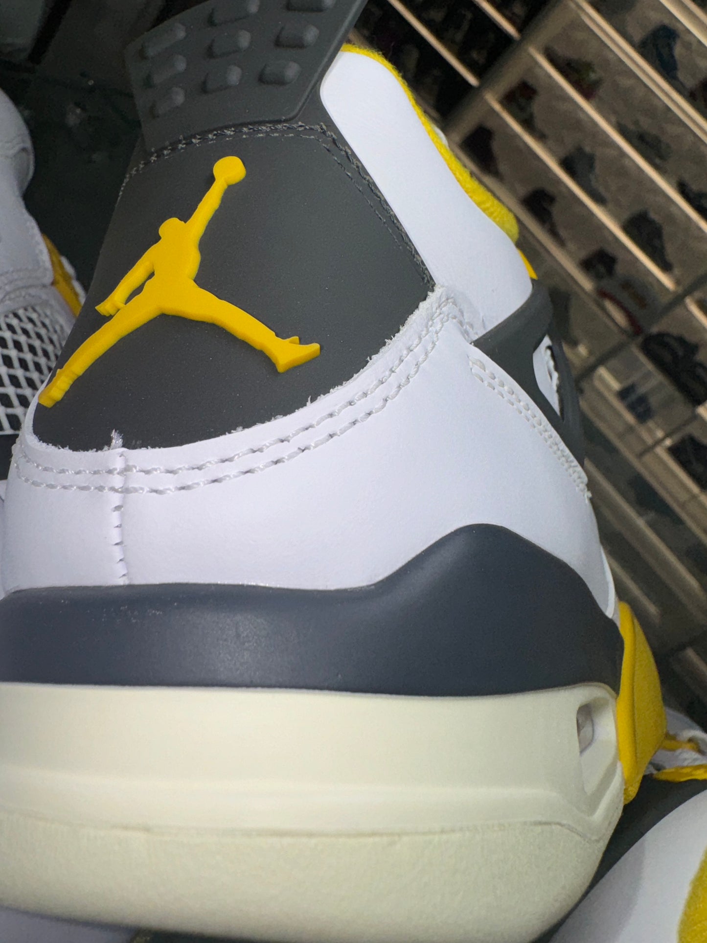 Jordan 4 Retro
Vivid Sulfur (Women's)