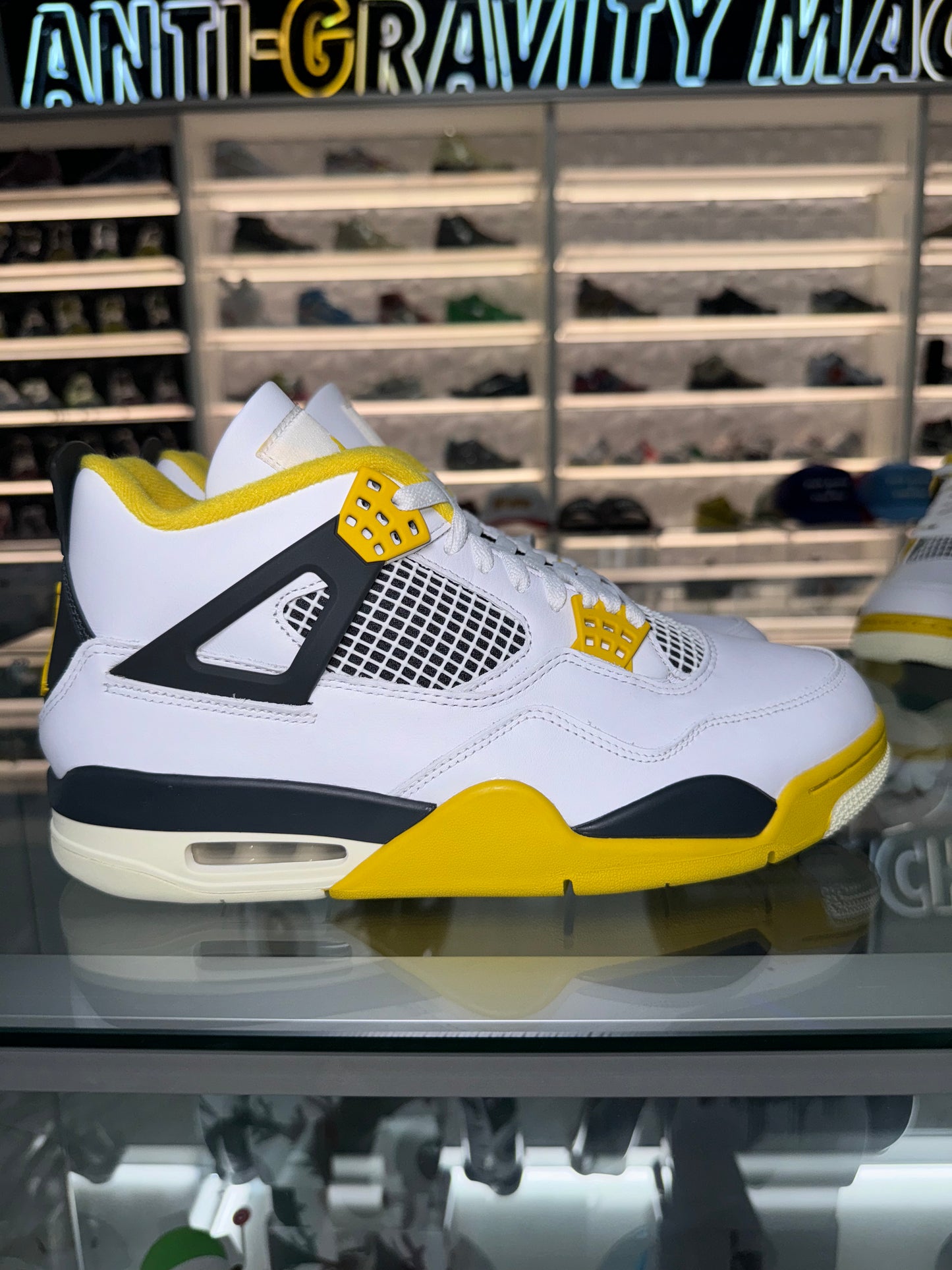 Jordan 4 Retro
Vivid Sulfur (Women's)