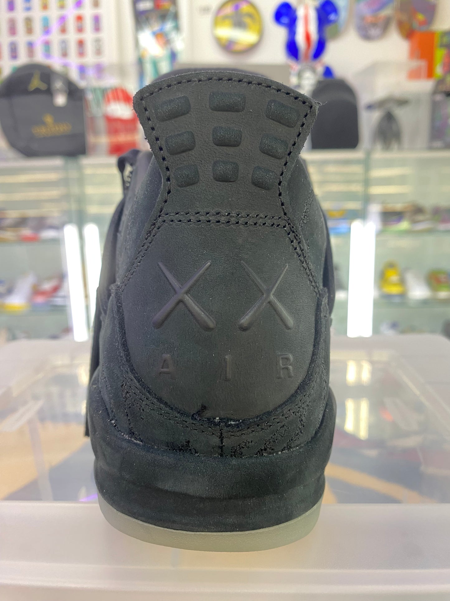 Air Jordan 4 Retro x KAWS 2017 Black/Glow