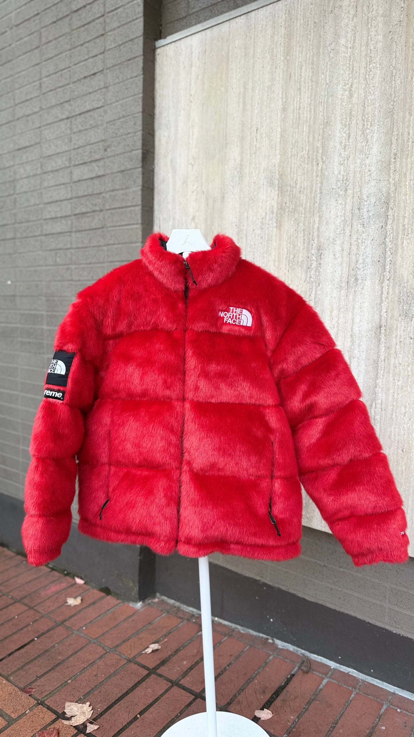 Supreme The North Face Faux Fur Nuptse Jacket
Red