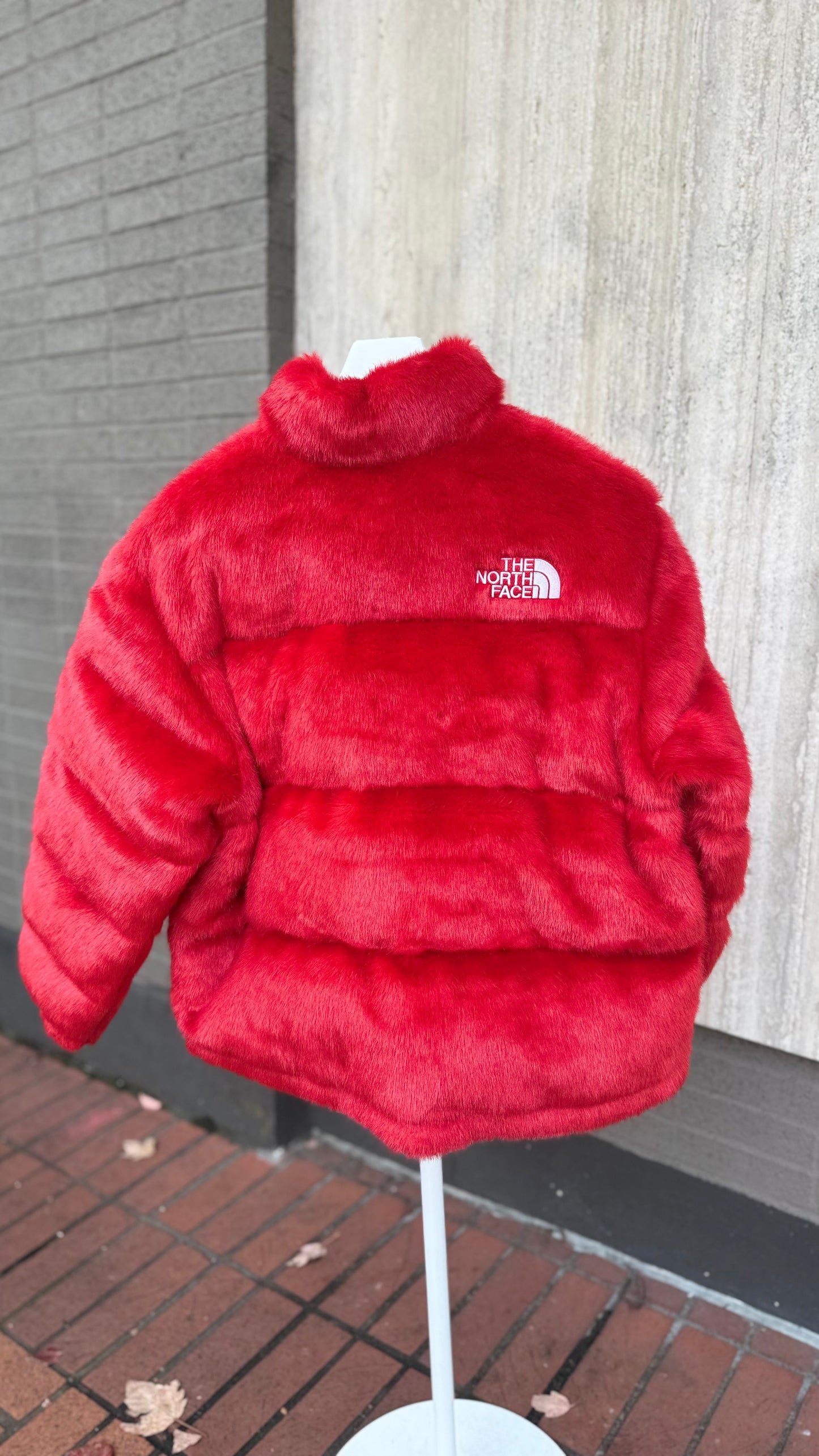 Supreme The North Face Faux Fur Nuptse Jacket
Red