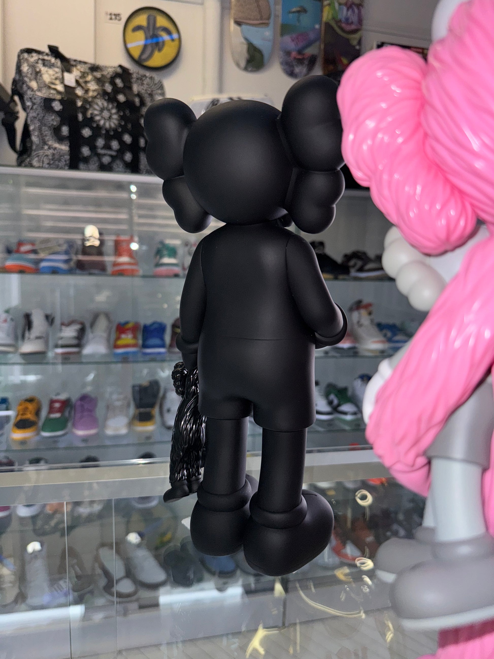 KAWS Share Vinyl Figure Black – Drexlers KAWS Share Vinyl Figure Black – Drexlers